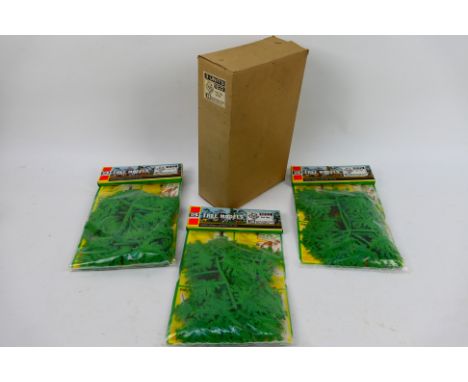 Britains - A Trade Box of 3 Britains #1822 Oak Tree Packs. The trees appear to be in Mint condition housed within Mint packs.