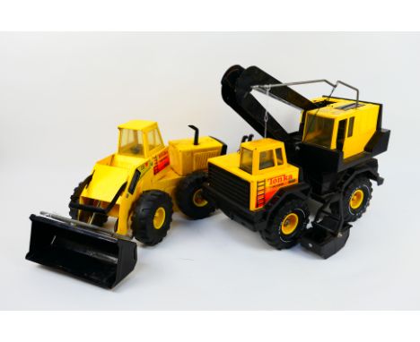 Tonka - 2 x tin plate Tonka construction vehicles - Lot includes a yellow Mighty Turbo Loader truck. A Tonka Turbo diesel cra