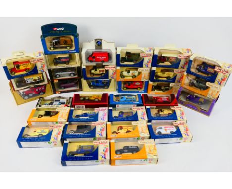 Corgi, Maisto, Matchbox, Lledo -  33 x boxed die-cast model vehicles - Lot includes a Maisto #21008 1/38 Plymouth Prowler. A 