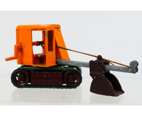 Moko - A rare unboxed early Moko Excavator in orange and brown with unpainted jib and green rubber tracks which are still pli