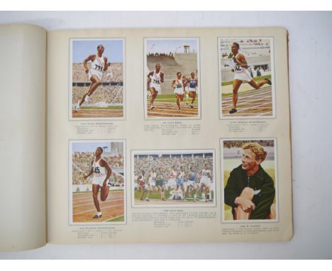 A scarce 1936 Berlin Olympics commemorative book produced by the Icelandic company O. Johnson &amp; Kaaber, 'Hinir XI. Olympi