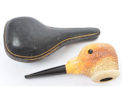 A vintage 20th century meerschaum bird smoking pipe. In the form of a bird poultry guinea fowl / pheasant head with glass eye