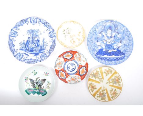 A collection of 19th century and later Asian / English ceramic display cabinet plates. Including blue and white Asian orienta