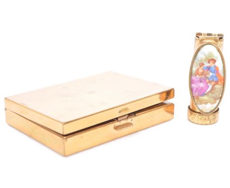 A Vintage Patrys Limoges Lipstick holder and Agme compact. The Swiss made compact having a gold tone exterior with engine tur