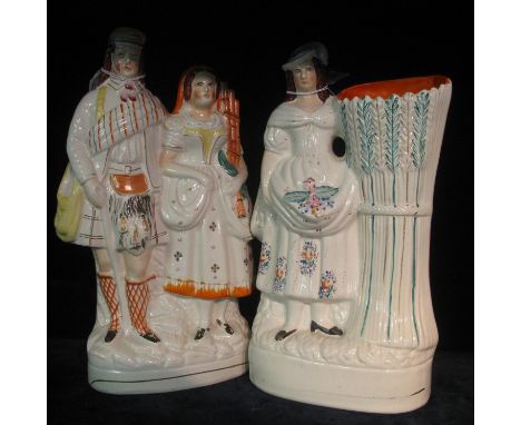 19th Century Staffordshire flat back figure group of man in kilt with his wife, together with a flat back figurine spill vase