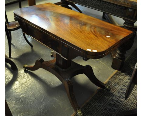 19th Century mahogany folding card table on quatreform base with brass paws and casters. (B.P. 21% + VAT) Baize is very good.