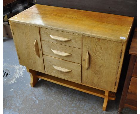 Mid Century oak Ercol style sideboard with under shelf. (B.P. 21% + VAT)Dimensions: 108 x 46 x 87cm approx.