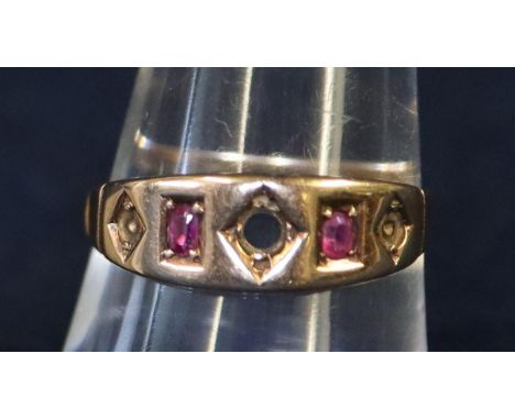 Yellow metal and ruby ring (centre stone missing). Approximate weight 2.1 grams. (B.P. 21% + VAT)