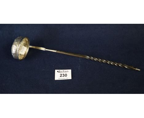 Silver repousse brandy ladle with inset Georgian coin and wrythen wooden handle.(B.P. 21% + VAT) 