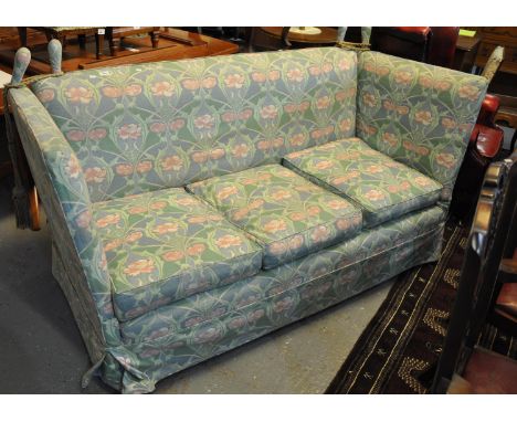 Early 20th Century three seater drop arm sofa, upholstered in William Morris style. (B.P. 21% + VAT) Structurally sound, used