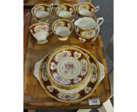 Tray of Royal Albert bone china 'Lady Hamilton' part teaset, together with a set of six Royal Worcester coffee cans and sauce