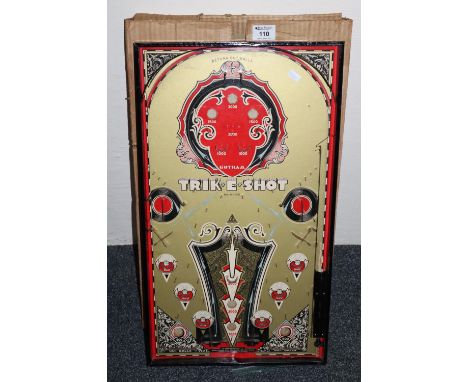 A Gotham Trik-e-shot bagatelle game in its original carton.(B.P. 21% + VAT) 