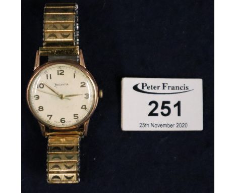Helvetia Swiss made gold gentleman's mechanical wristwatch having Arabic numerals and sweep seconds hand, on associated expan