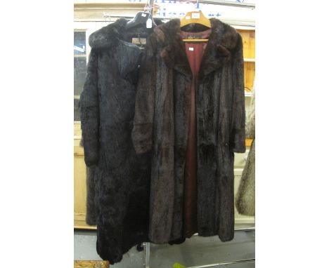 Two long black or dark brown vintage fur coats, one rabbit fur by Canopy and the other mink by Cornelius.  (2)(B.P. 21% + VAT