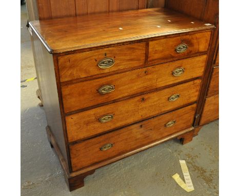 Early 19th Century mahogany straight front chest of two short and three long drawers standing on bracket feet. (B.P. 21% + VA