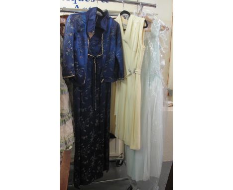 Three vintage dresses to include; a 60s empire line Chinese silk fabric dress with matching bolero, a pale yellow 60s shift d