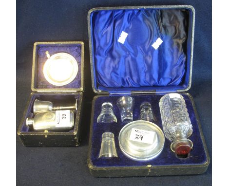 Silver plated travelling communion wine set to include; small paten chalice and flask in fitted box. Together with another si