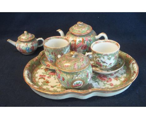 Chinese Canton porcelain famille rose design cabaret tea for two set with two cups and saucers, teapot, sucrier and cover, an