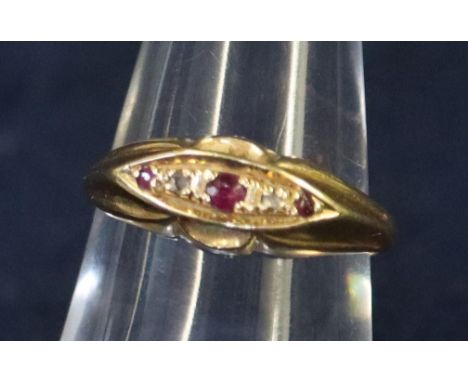 18ct gold diamond and ruby ring.  Approximate weight 3 grams.(B.P. 21% + VAT) 