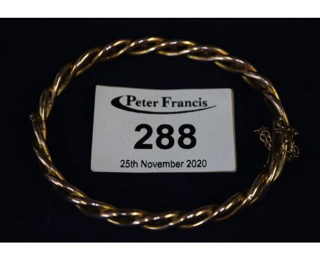 9ct gold woven twist bangle.  Approximate weight 8 grams.(B.P. 21% + VAT)s. 