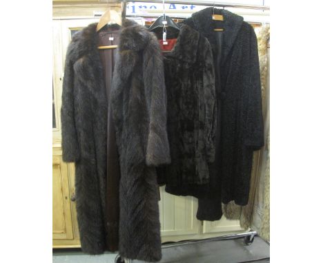 A vintage faux fur jacket, an astrakhan swing coat and a dark brown mink tail fur vintage coat. (3)(B.P. 21% + VAT) 