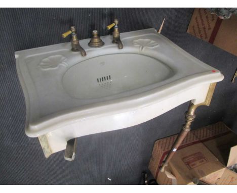 A Bolding 'Simplex' wash basin with brass taps on brass and copper supports, 81cms wide A/F