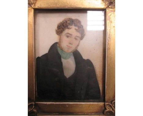 A 19th century portrait miniature of a young man, in gilt frame; and a small oil on panel of a praying child possibly the inf