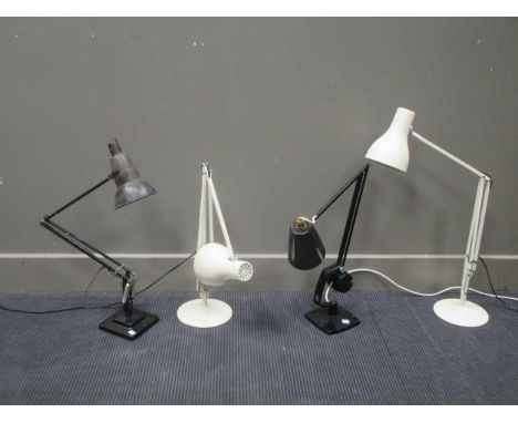 An anglepoise type lamp on caster base, two other anglepoise type lamps and two modern lamps (5)