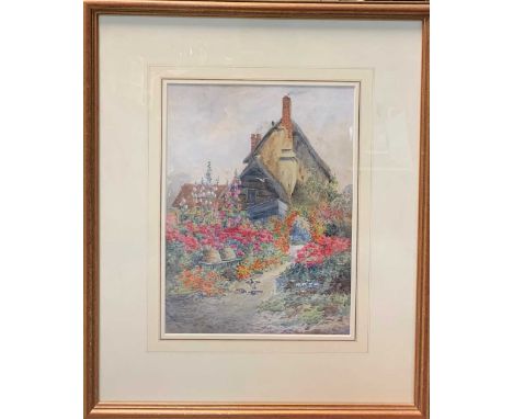 Lillian Stannard (British, 1877-1944), A Garden scene with cottage, Devon, signed lower left with a monogram, watercolour, 37