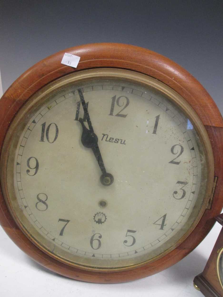 A modern mantle clock by Comitti in mahogany case 24cm high and a wall