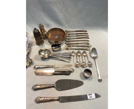 a collection of silverware including casters, flatware, a wine coaster, napkin ring etc 24.4ozt weighable silver, together wi