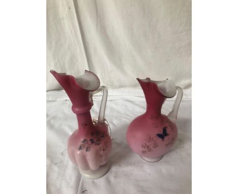  Sale Item:    2 PINK SATIN GLASS JUGS   Vat Status:   No Vat   Buyers Premium:  This lot is subject to a Buyers Premium of 1