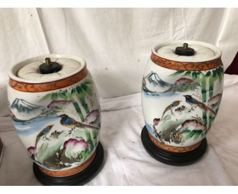  Sale Item:    2 PORCELAIN ORIENTAL HEAD RESTS CONVERTED TO TABLE LAMP BASES  Vat Status:   No Vat   Buyers Premium:  This lo