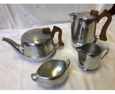  Sale Item:    4 PCS PIQUOT WARE   Vat Status:   No Vat   Buyers Premium:  This lot is subject to a Buyers Premium of 15% + V