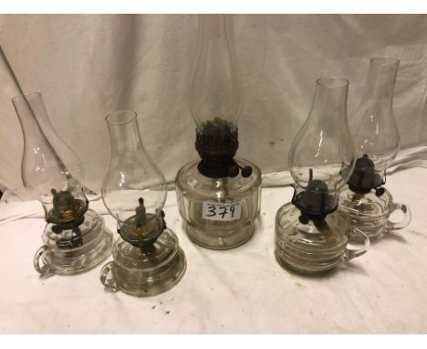  Sale Item:    5 OIL LAMPS (AF)   Vat Status:   No Vat   Buyers Premium:  This lot is subject to a Buyers Premium of 15% + Va