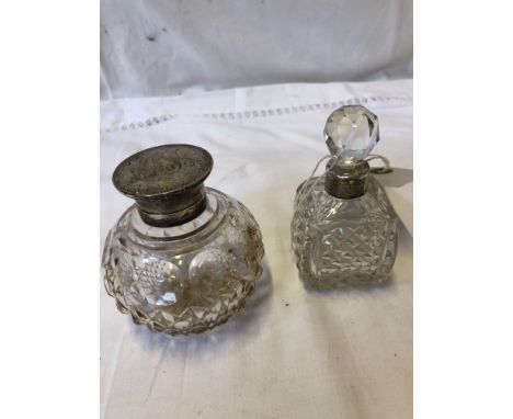  Sale Item:    2 SILVER TOPPED PERFUME BOTTLES   Vat Status:   No Vat   Buyers Premium:  This lot is subject to a Buyers Prem