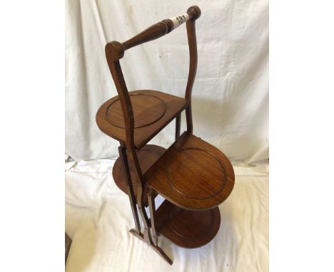  Sale Item:    4 TIER FOLDING CAKESTAND   Vat Status:   No Vat   Buyers Premium:  This lot is subject to a Buyers Premium of 