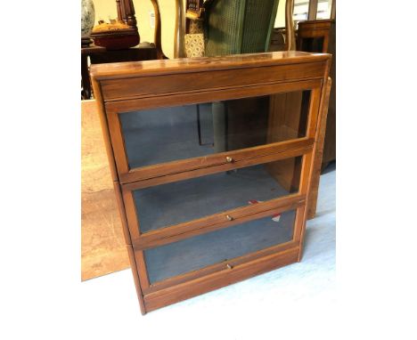  Sale Item:    3 DOOR STACKING BOOKCASE   Vat Status:   No Vat   Buyers Premium:  This lot is subject to a Buyers Premium of 