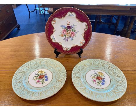 Two Royal Worcester Cabinet Plates, 10.5" diameter, mint green and gilt trim with central floral design, and a Crown Stafford
