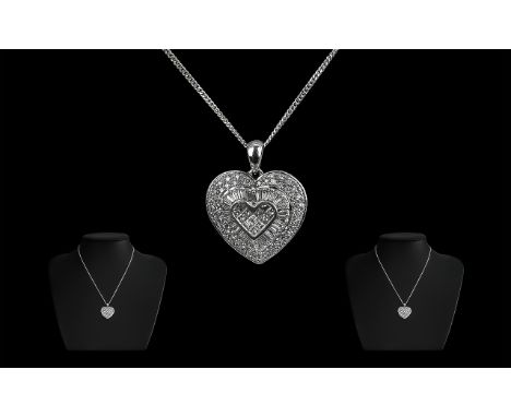 14ct White Gold Attractive Diamond Set Heart Shaped Pendant with Attached 9ct Gold Marked Chain. Pendant Marked 14ct, Chain M