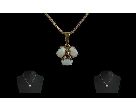 Ladies Nice Quality and Attractive 9ct Gold Opal and Diamond Set Pendant Drop with Later 9ct Gold Chain. Both Marked for 9ct.