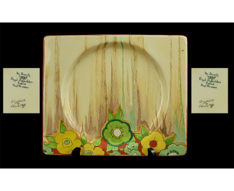 A Clarice Cliff Bizarre 'Jonquil' Biarritz Plate c1933 and of rectangular form. Approximately 7.5 by 9 inches. Very good cond