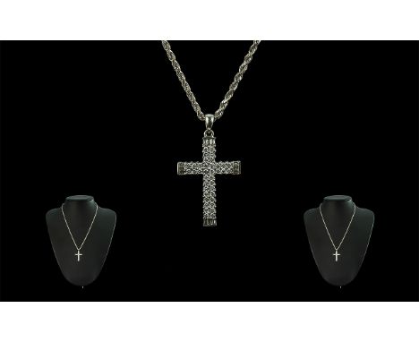 18ct White Gold Diamond Set Cross Attached to a 9ct Gold Chain. Cross Marked 750 - 18ct, Chain Marked 9ct. The Diamonds of Go