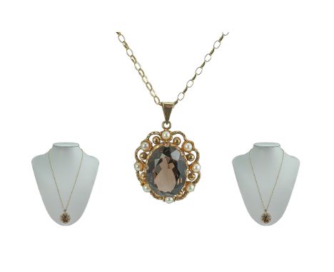 Ladies 9ct Gold Attractive Smoky Topaz and Pearl Set Pendant attached to a 9ct gold fancy chain, boyh marked 9.375; the facet