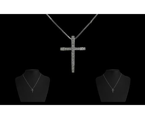 18ct White Gold Diamond Cross and Chain the pendant set with round brilliant cut diamonds. suspended on a fine box link chain