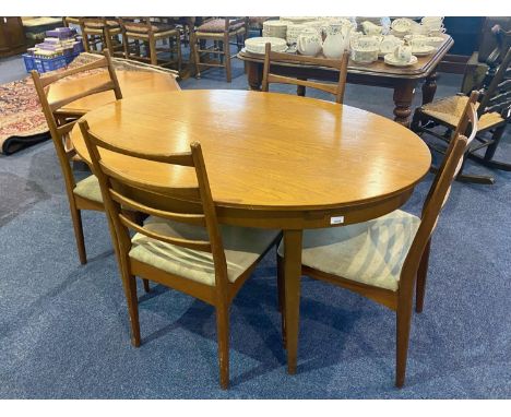 1960's Extendible Teak Table &amp; Chairs, table of oval shape, measures approx 54'' x 38'', height 29''.  Please see images.