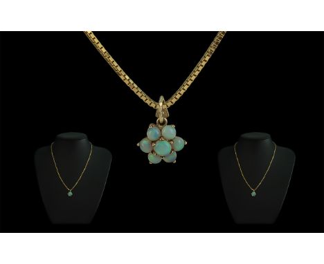 9ct Gold Opal Pendant, set in a flowerhead, suspended on a 9ct gold box chain.  Approx 16".  Gross weight 6.6 grams.