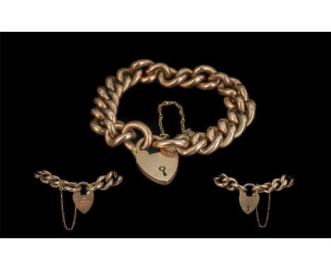 Antique Period Attractive 9ct Gold Curb Bracelet with a 9ct gold heart shaped padlock and safety chain, marked 9ct gold; come