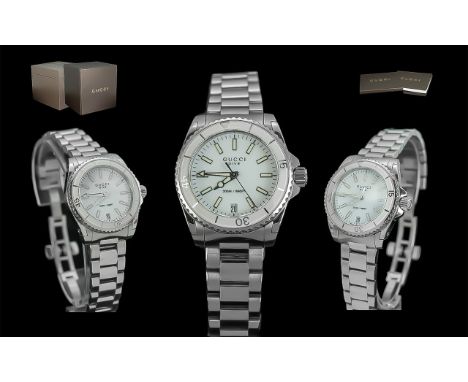 Gucci - Dive Ladies Stainless Steel Wristwatch, water resistant to 660 feet; features white enamel dial with luminous markers