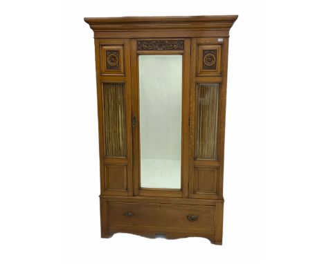 Edwardian oak wardrobe, single mirror door, glazed panels with decorative curtains behind, single drawer to baseDimensions: H